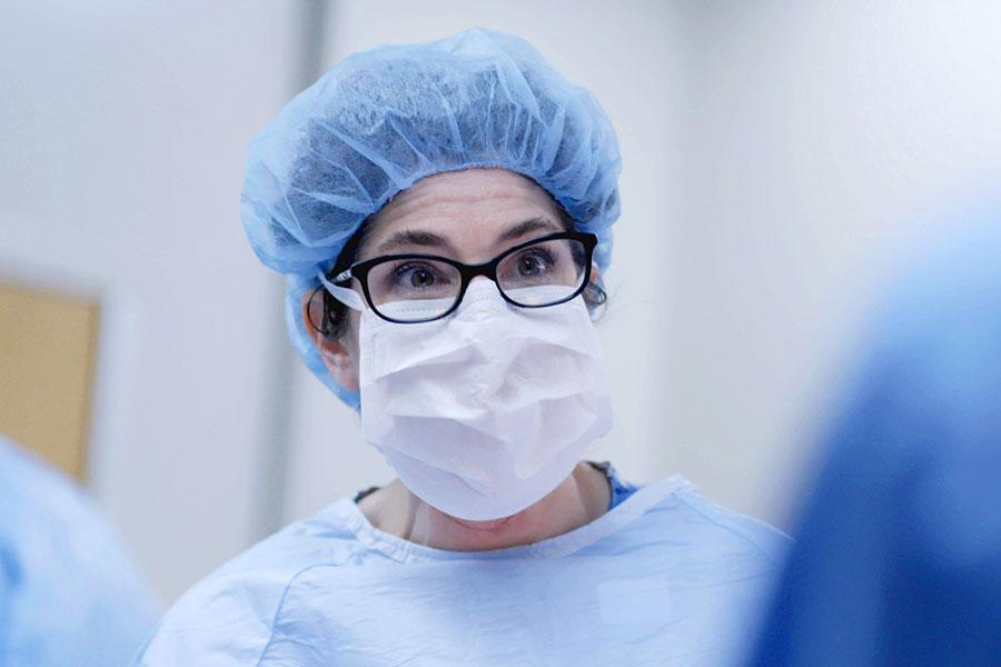 Closeup of Dr. Lisa Rae wearing a face mask