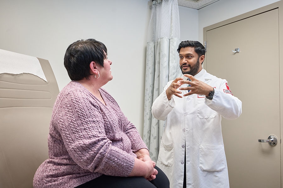 Dr. Rohit Soans with a patient