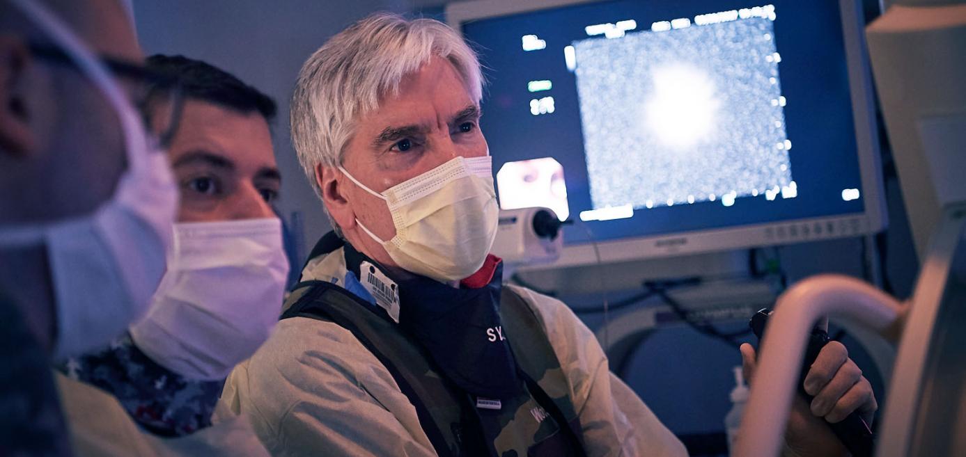 Temple lung specialist performing a procedure in operating room